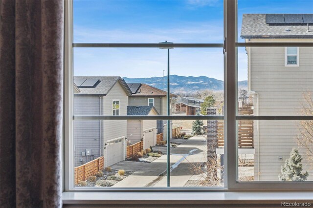 balcony featuring a mountain view