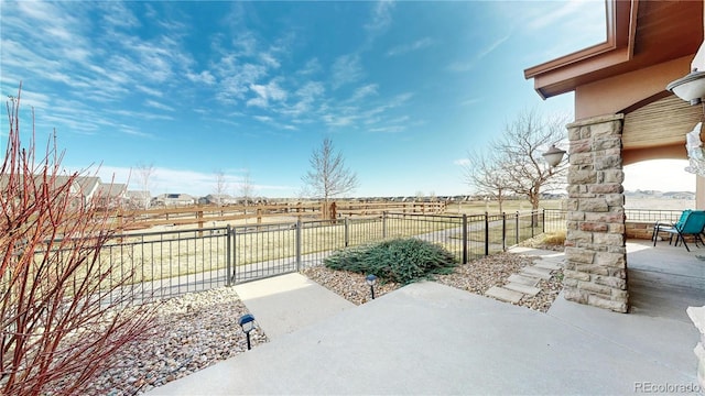 view of patio with fence