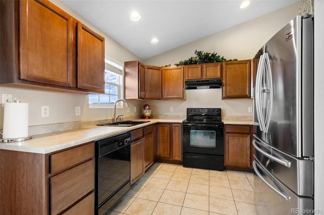 kitchen with light tile patterned flooring, black appliances, extractor fan, sink, and vaulted ceiling