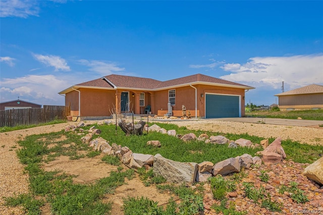 ranch-style house with a garage