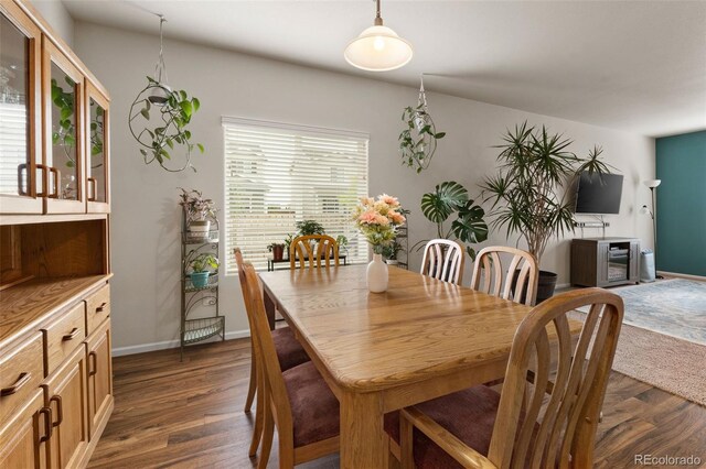 1836 Taos St, Brighton, CO 80603 - dining space with dark wood-type flooring and baseboards