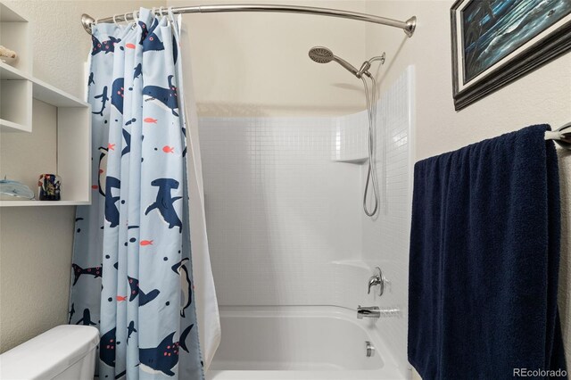 1836 Taos St, Brighton, CO 80603 - bathroom featuring shower / bath combination with curtain and toilet