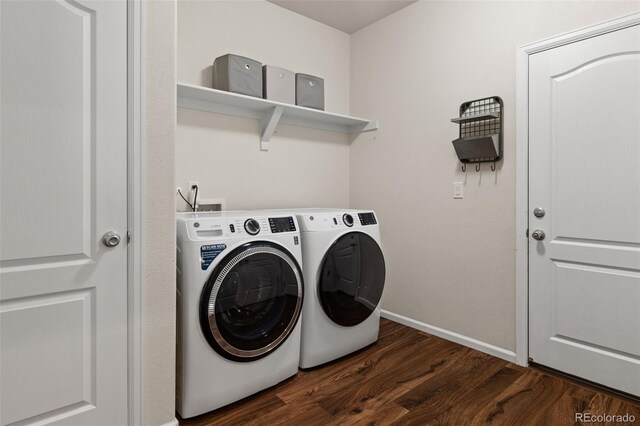 1836 Taos St, Brighton, CO 80603 - washroom with washer and clothes dryer, dark wood-style floors, and baseboards