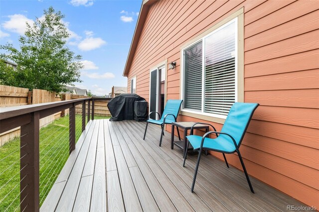 1836 Taos St, Brighton, CO 80603 - wooden terrace featuring area for grilling