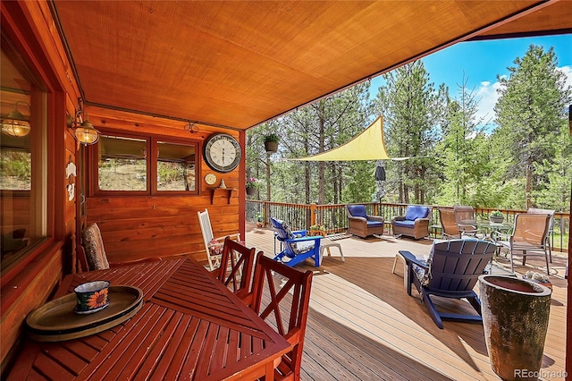 sunroom with wood ceiling