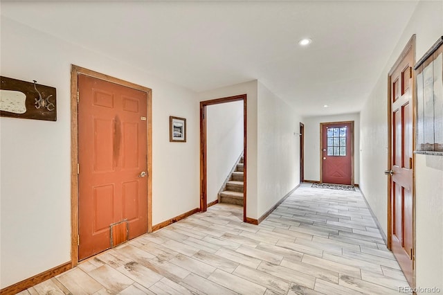 foyer entrance with light wood-type flooring