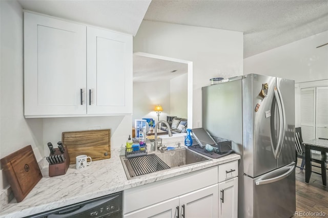 1111 S Garrison St Unit 202, Lakewood, CO 80232 - kitchen with a sink, dishwasher, white cabinetry, and dark wood-style flooring