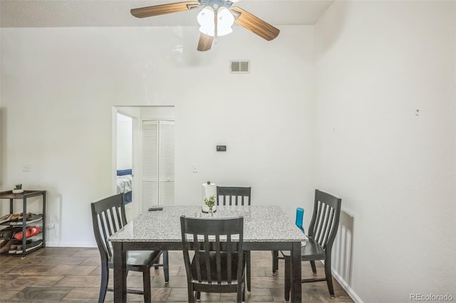 1111 S Garrison St Unit 202, Lakewood, CO 80232 - dining area with ceiling fan and baseboards