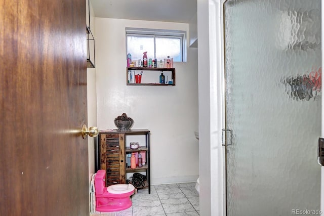 bathroom featuring walk in shower