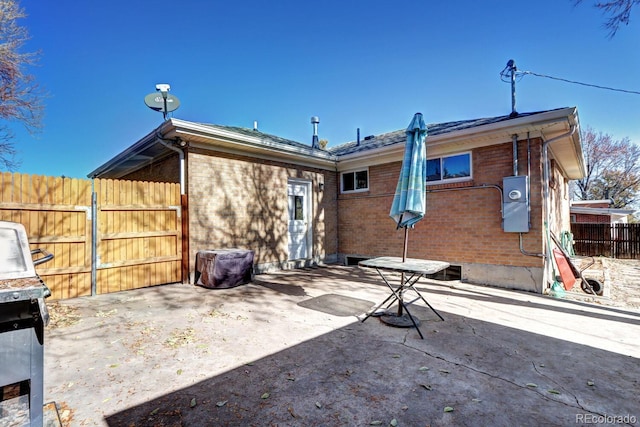 back of house featuring a patio area