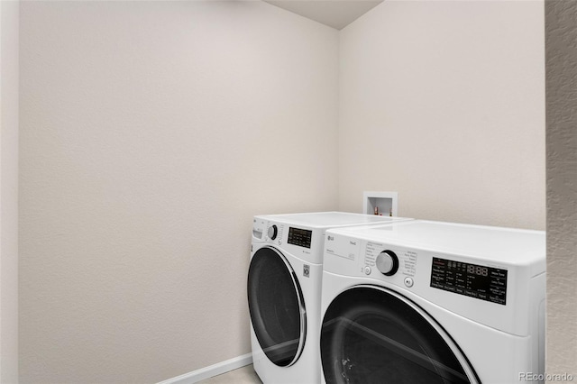 4666 S Malaya Ct, Aurora, CO 80015 - laundry room featuring independent washer and dryer and baseboards