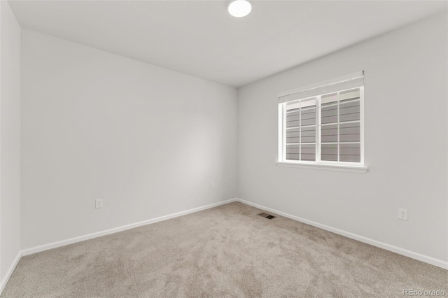 4666 S Malaya Ct, Aurora, CO 80015 - spare room featuring carpet floors and baseboards