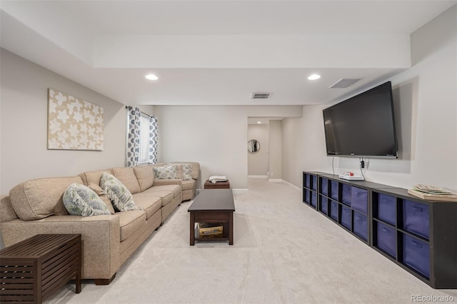 living area with light carpet, visible vents, recessed lighting, and baseboards