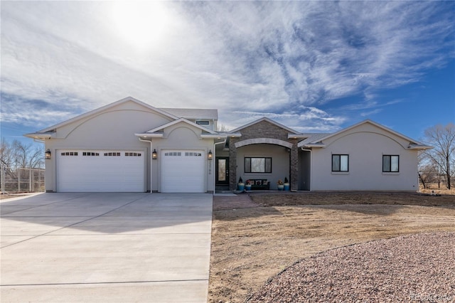 single story home featuring a garage