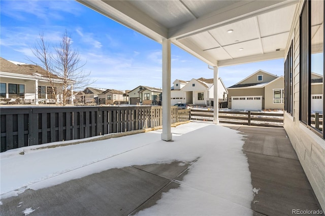 view of patio / terrace featuring a garage