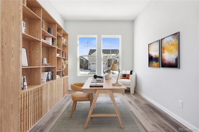 unfurnished room featuring wood-type flooring