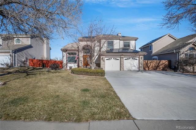 front facade with a front lawn and a garage