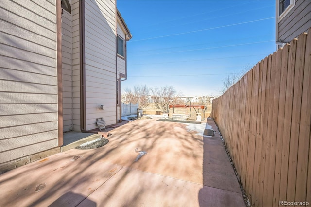 view of property exterior featuring a patio area