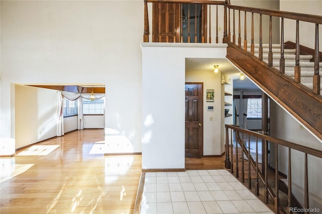 foyer featuring a high ceiling