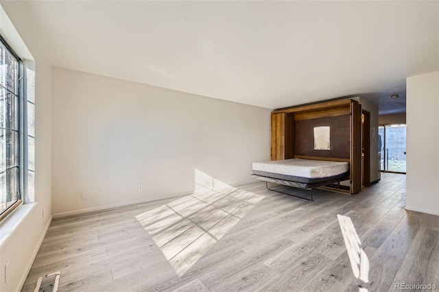 unfurnished bedroom featuring light hardwood / wood-style floors