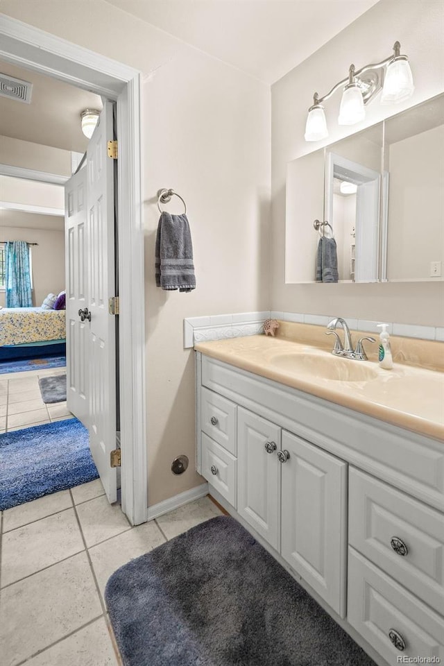 1060 Alta Vista Dr, Craig, CO 81625 - bathroom with tile patterned flooring and vanity