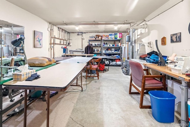 1060 Alta Vista Dr, Craig, CO 81625 - garage featuring a workshop area and water heater