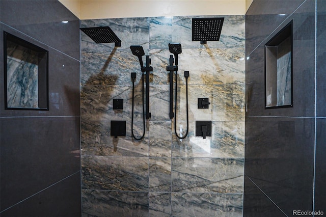 interior details with a tile shower