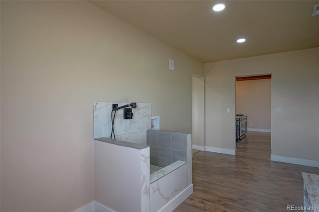 corridor featuring hardwood / wood-style flooring