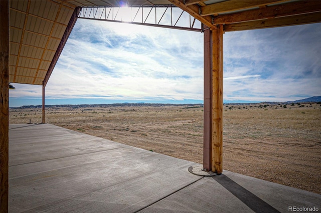 view of patio / terrace featuring a rural view