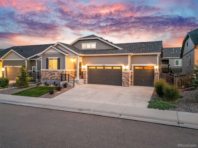 craftsman-style home featuring a garage