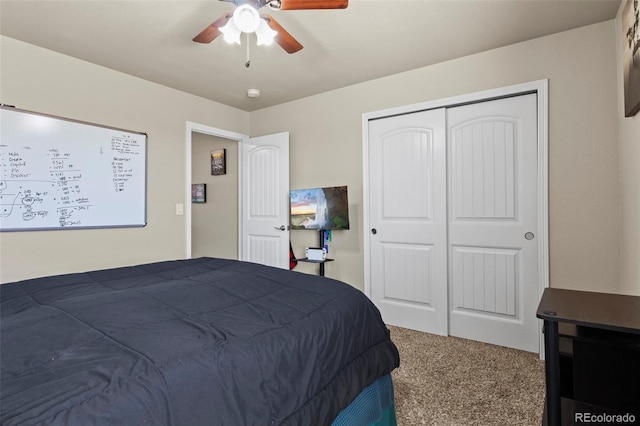 bedroom with a closet, carpet, and ceiling fan