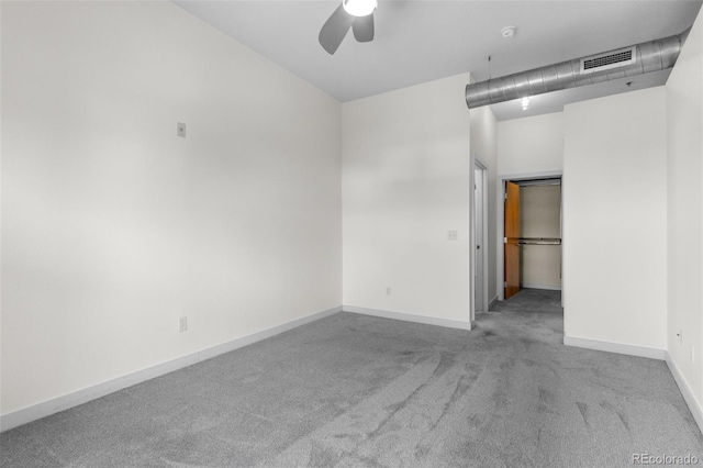 7700 E 29th Ave Unit 304, Denver, CO 80238 - spare room with carpet, ceiling fan, and a smoke detector