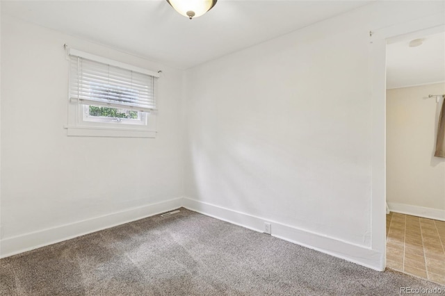 1340 Iola St, Aurora, CO 80010 - unfurnished room with carpet flooring