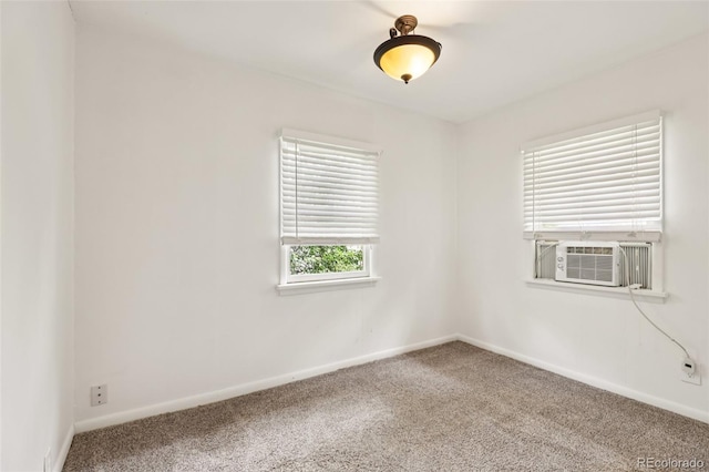 1340 Iola St, Aurora, CO 80010 - carpeted empty room with baseboards and cooling unit