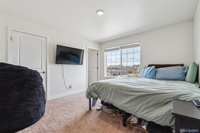 7498 E 157th Pl, Thornton, CO 80602 - carpeted bedroom with baseboards