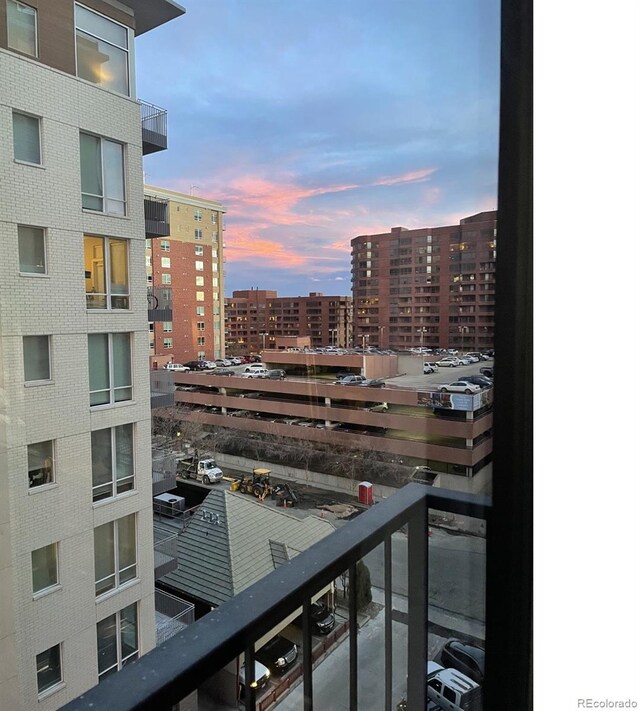 2 Adams St Unit 809, Denver, CO 80206 - balcony at dusk with a view of city