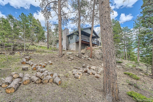 28669 Mountain View Rd, Conifer, CO 80433 - view of side of property with a deck