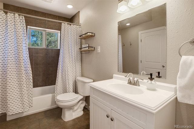 full bathroom with shower / bath combination with curtain, tile patterned flooring, vanity, and toilet