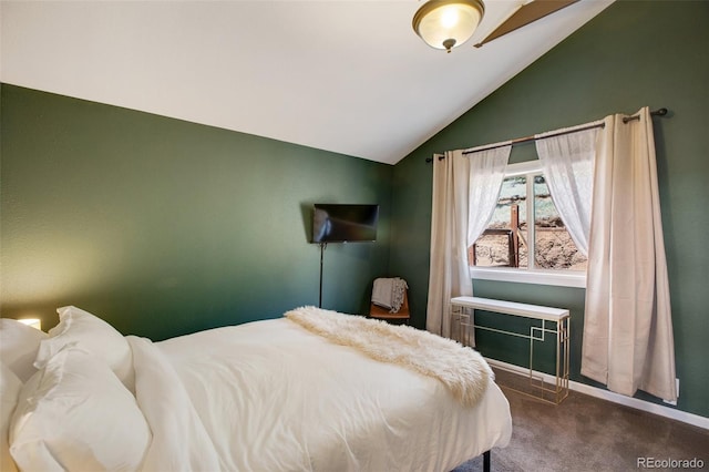 carpeted bedroom with vaulted ceiling