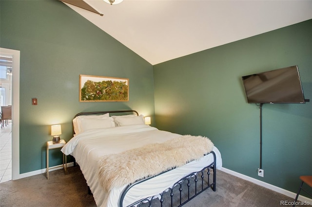 bedroom with high vaulted ceiling and carpet floors