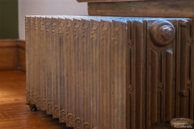 2845 Quitman St, Denver, CO 80212 - detailed view of radiator heating unit and wood finished floors