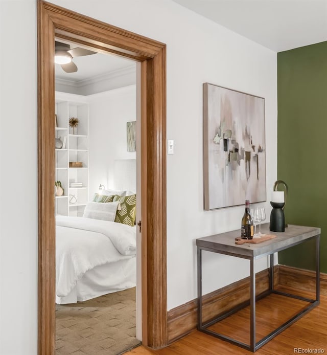 2845 Quitman St, Denver, CO 80212 - hallway featuring wood finished floors, ornamental molding, and baseboards