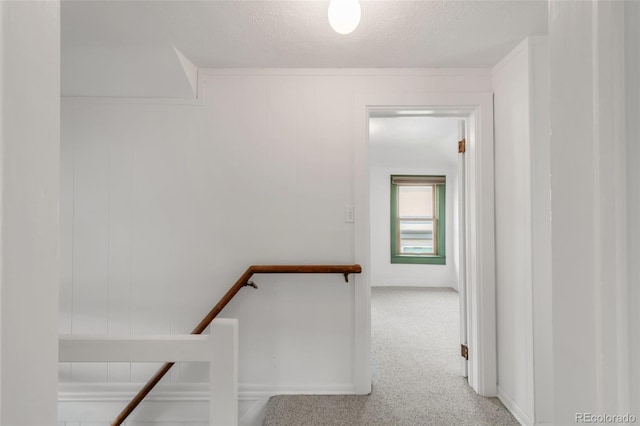2845 Quitman St, Denver, CO 80212 - corridor featuring an upstairs landing and a textured ceiling