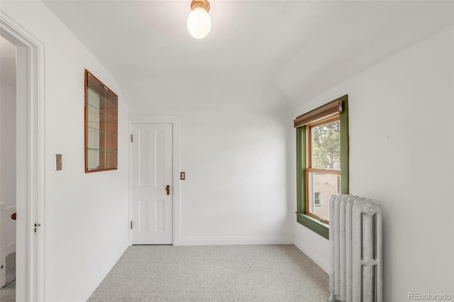 2845 Quitman St, Denver, CO 80212 - empty room featuring radiator, light carpet, and baseboards