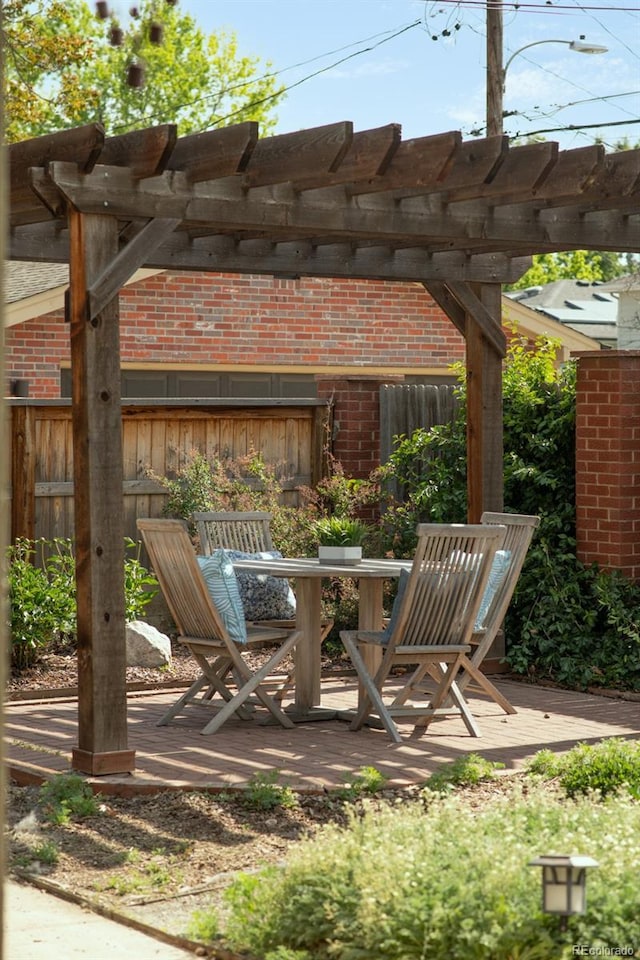 2845 Quitman St, Denver, CO 80212 - view of patio featuring a pergola, a deck, and outdoor dining space