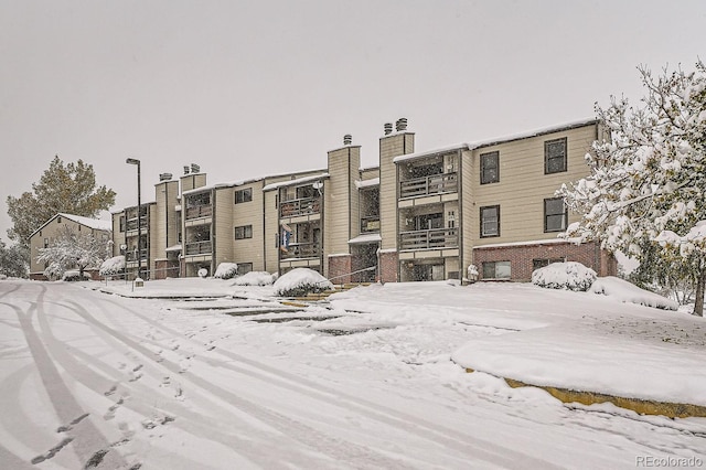 view of snow covered building