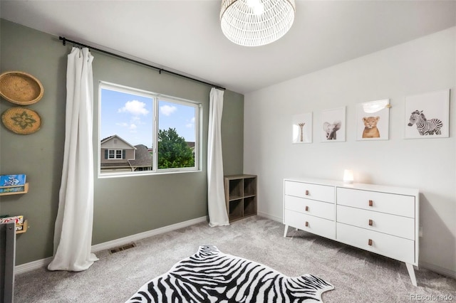 2204 Reed Grass Way, Colorado Springs, CO 80915 - bedroom featuring light colored carpet and baseboards