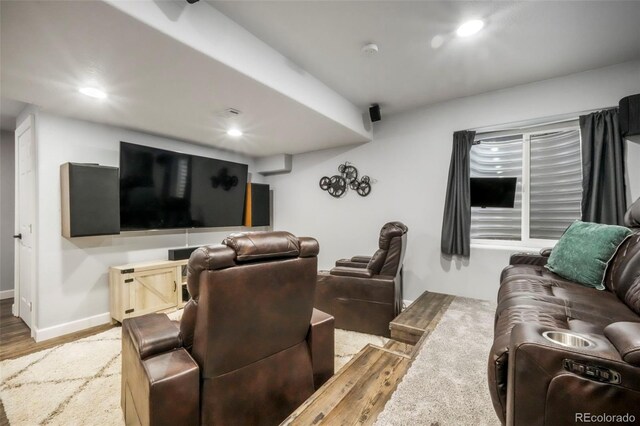 2204 Reed Grass Way, Colorado Springs, CO 80915 - home theater room with light wood finished floors, baseboards, and recessed lighting