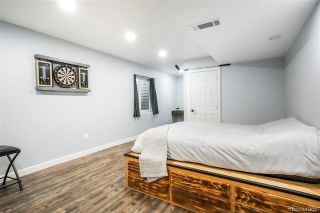 2204 Reed Grass Way, Colorado Springs, CO 80915 - bedroom featuring wood finished floors, baseboards, and recessed lighting