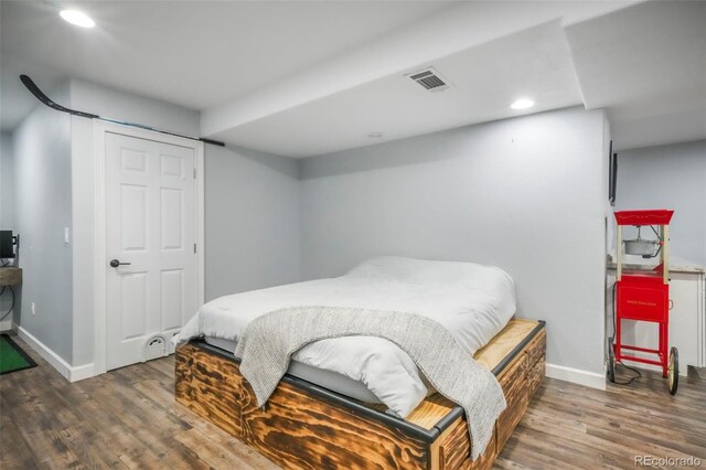 2204 Reed Grass Way, Colorado Springs, CO 80915 - bedroom featuring wood finished floors, baseboards, and recessed lighting